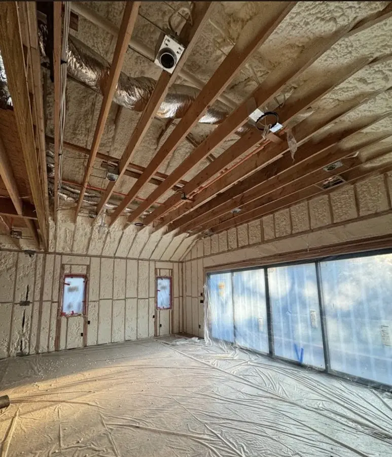 Interior walls and ceiling insulated with spray foam during new construction in Macedonia